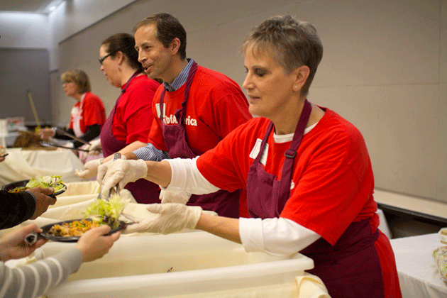 Group of Bank of America volunteers serving lunch