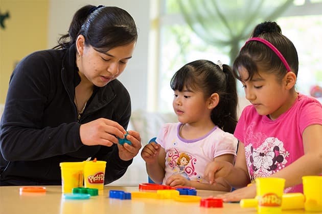 two young children learning