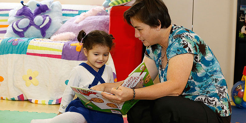 Parent-Child Home mother teaches toddler and both benefit