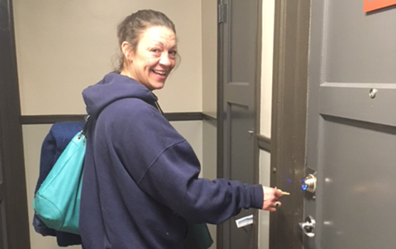 Ending homeless through Streets to Home: Marrissa in her new apartment