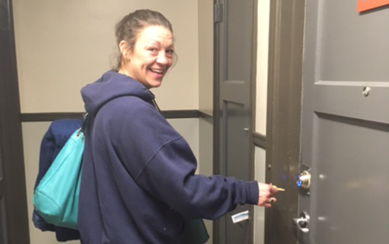 Ending homeless through Streets to Home: Marrissa in her new apartment