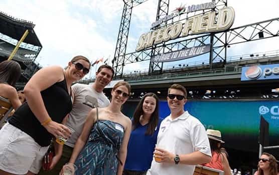 Five young professionals enjoy an exclusive event at Safeco Field spotlighting Seattle generosity with United Way of King County.
