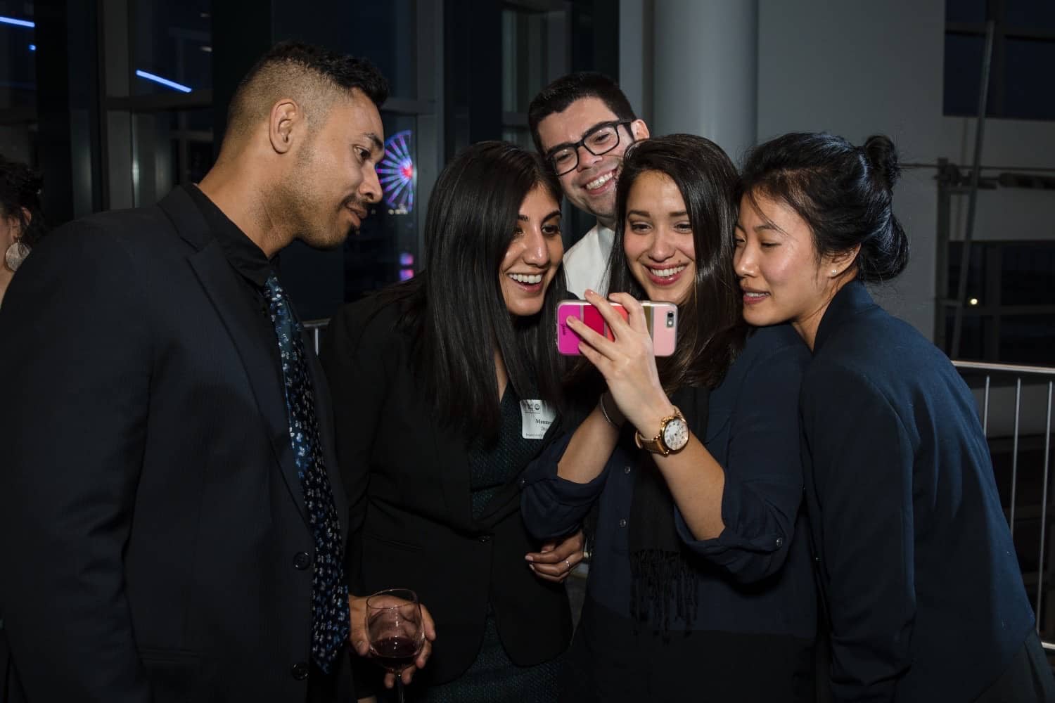 Project LEAD graduates looking at a selfie