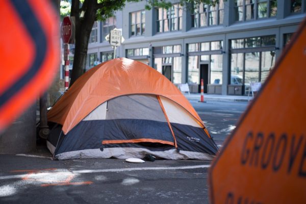 Two homeless guests at the 2017 Community Resource Exchange search for shelters in Seattle