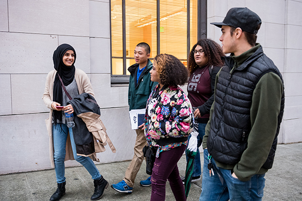 group of students walk in a group.