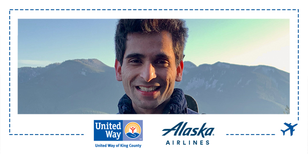 A man with a mountain backdrop looking at the camera with United Way and Alaska Airlines logos at the bottom.