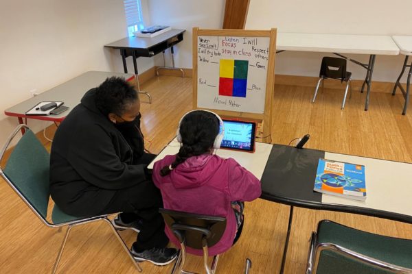 A screenshot of Ginger Kwan and Gordon McHenry, Jr., during their livestream interview on rental assistance and racial equity