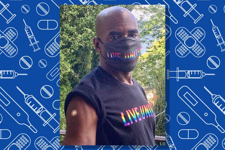 A man wearing Live United t-shirt and mask with a band-aid showing the spot where he got vaccinated.