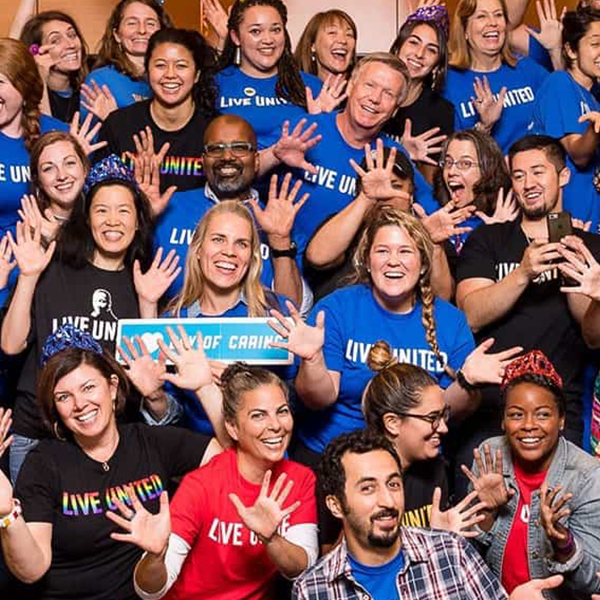 Group shot of UWKC staff at Day of Caring wearing Live United shirts