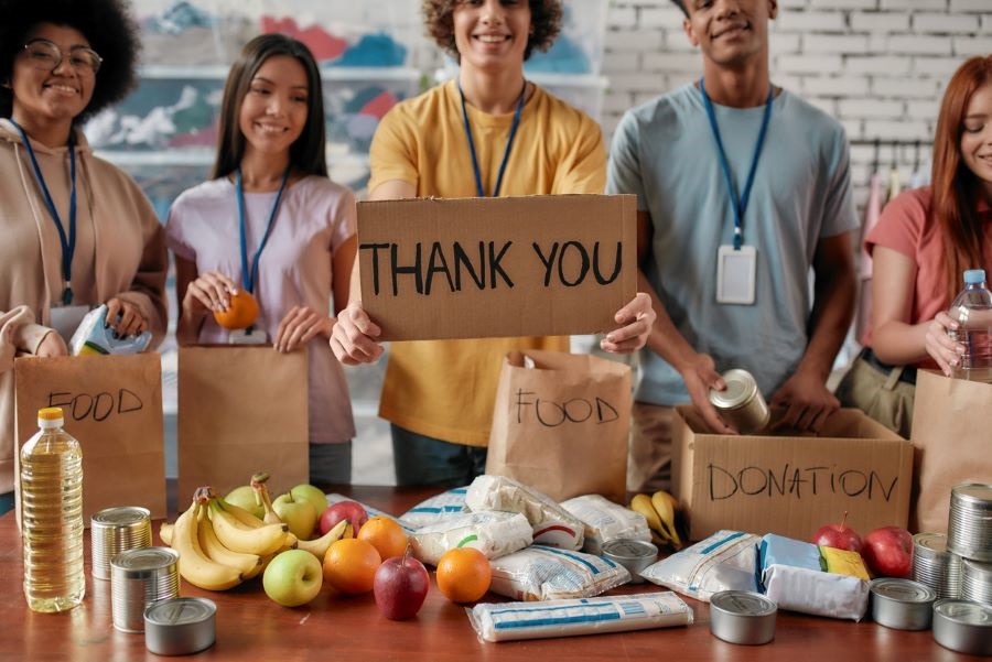 volunteers with donated food