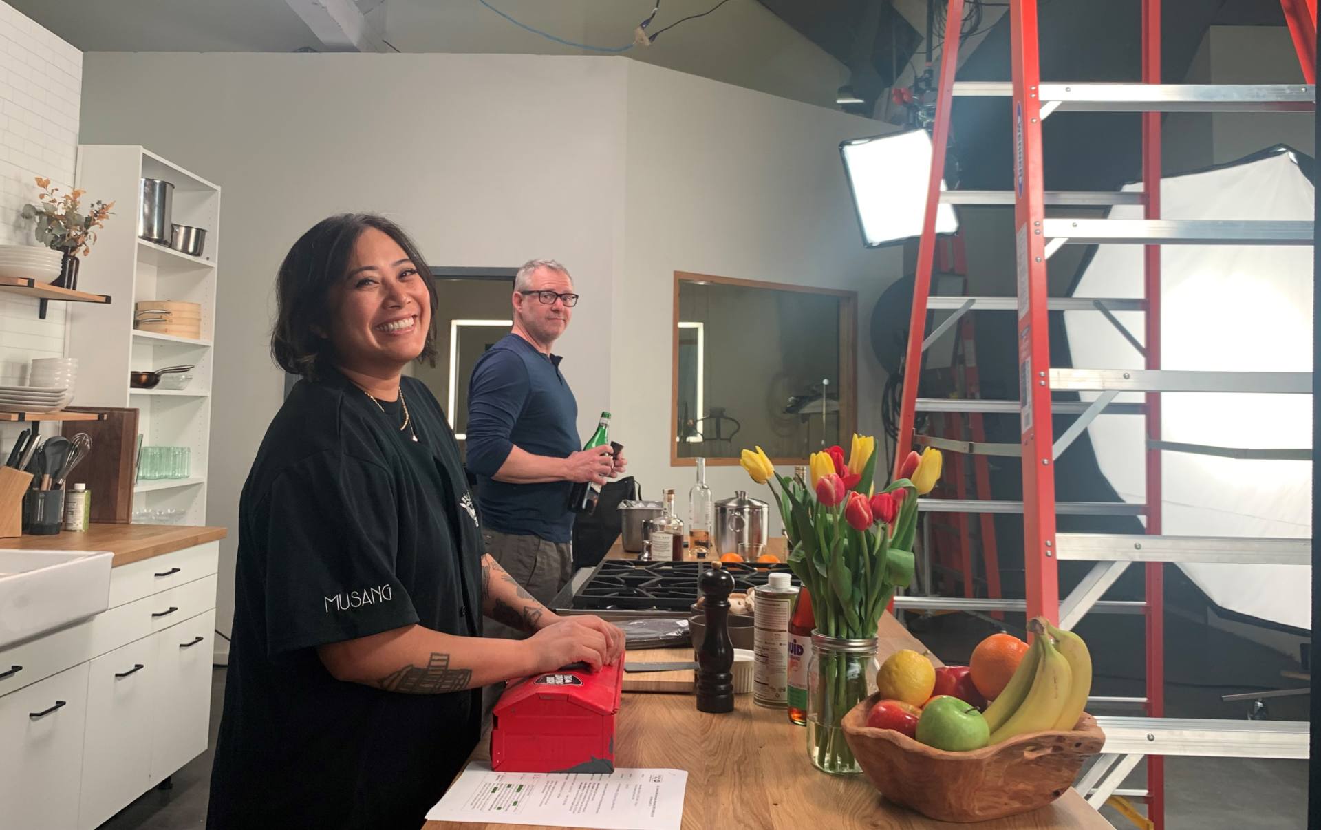 Image of chefs Melissa Miranda and Ethan Stowell in a makeshift kitchen conducting a cooking class