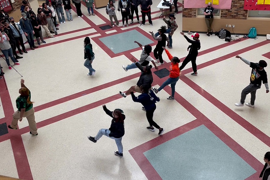 Members of the Renton High School Black Student Union Dance Team and Renton High K-Pop Dance Team performing at the school.