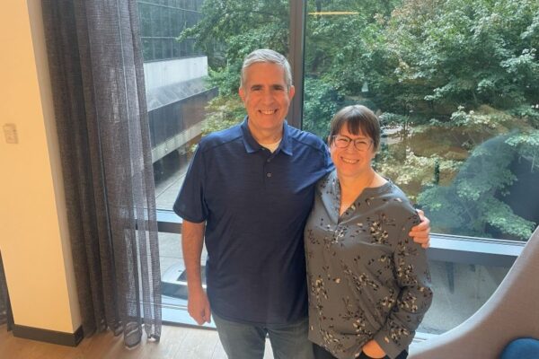African American girl with school notebook